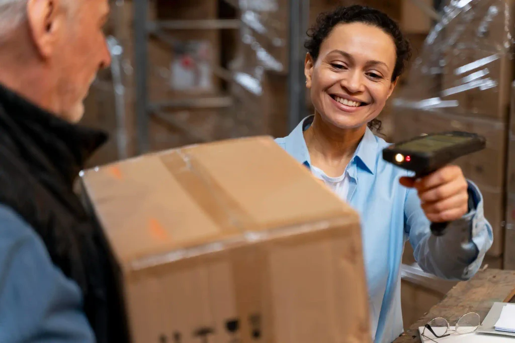 Employees working with order to cash processes in a warehouse